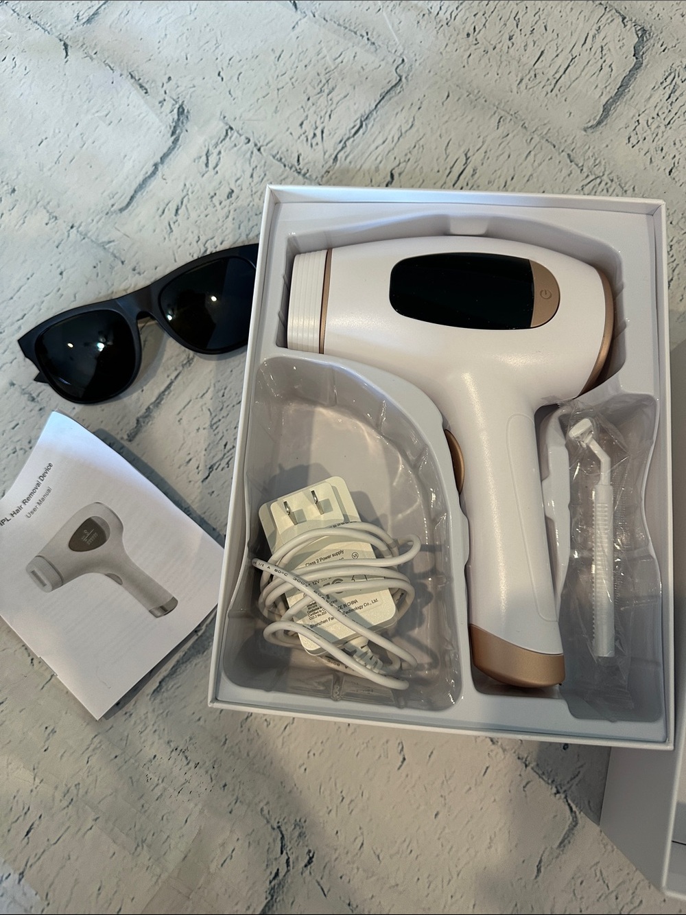 At-Home IPL Hair Removal Device in White with Rose Gold Accents